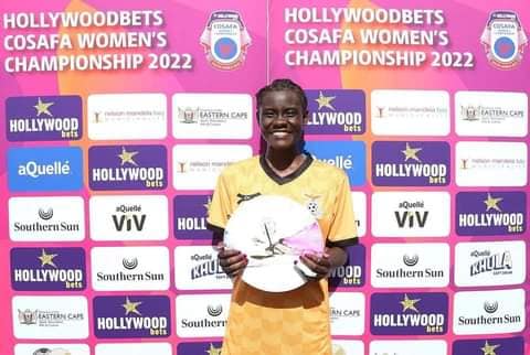 Evarine Susan Katongo gets a player of the match award.